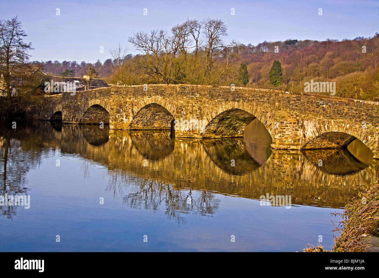 Newby Bridge reflecting in the early morning sun on Lake Windermere