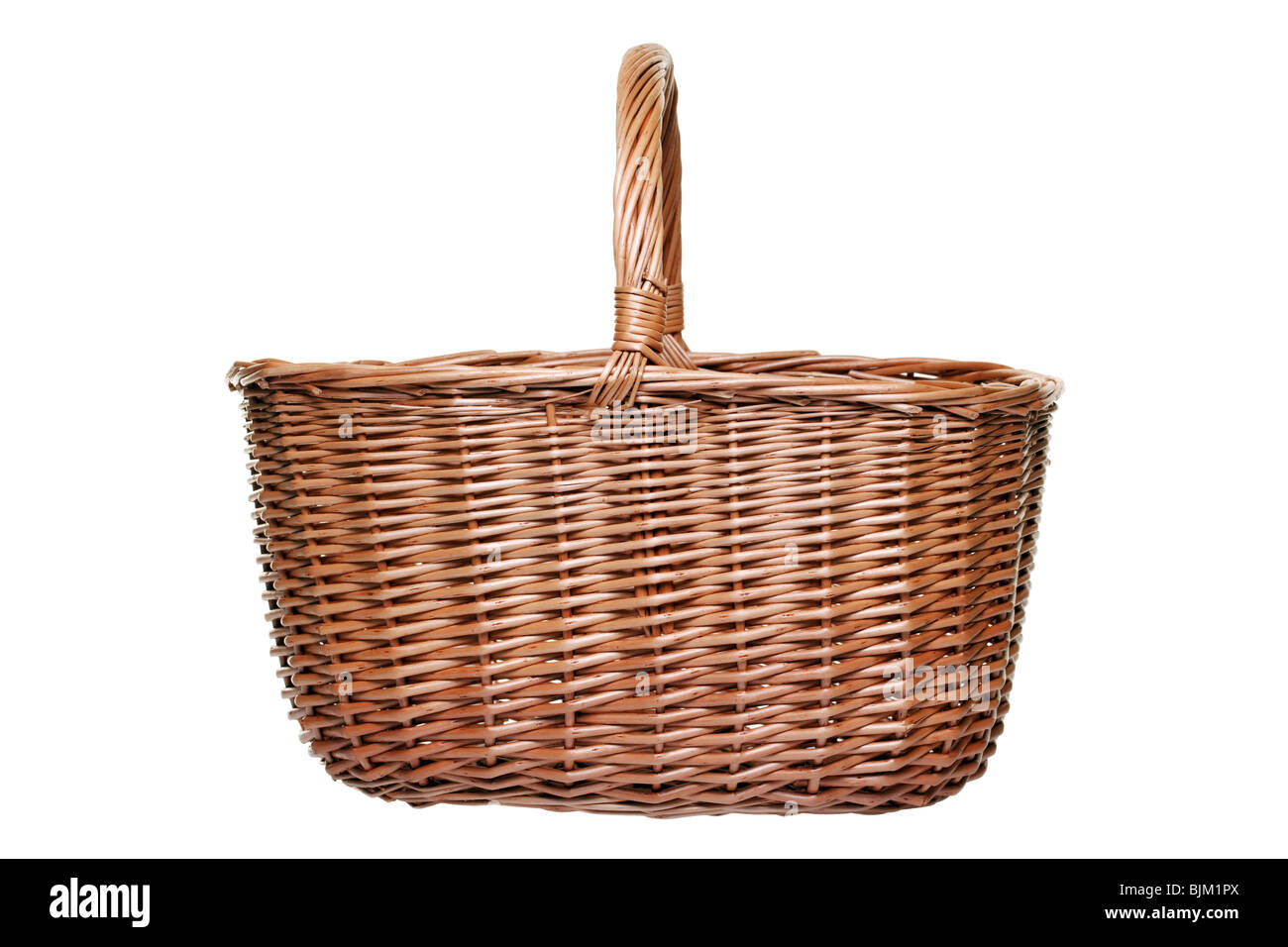Traditional wicker shopping basket weaved from willow, isolated on a