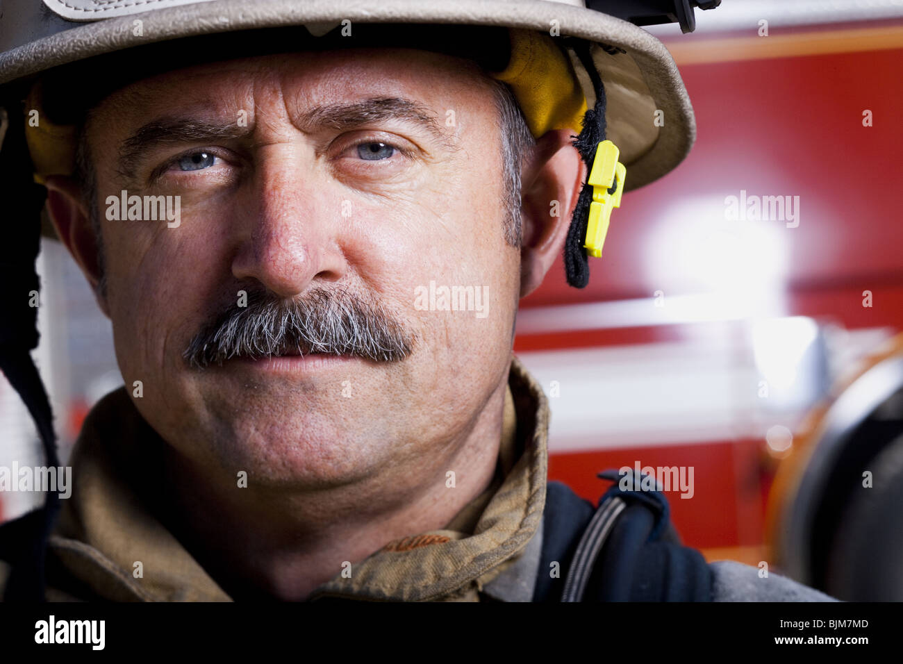 Portrait of a firefighter smiling Stock Photo Alamy