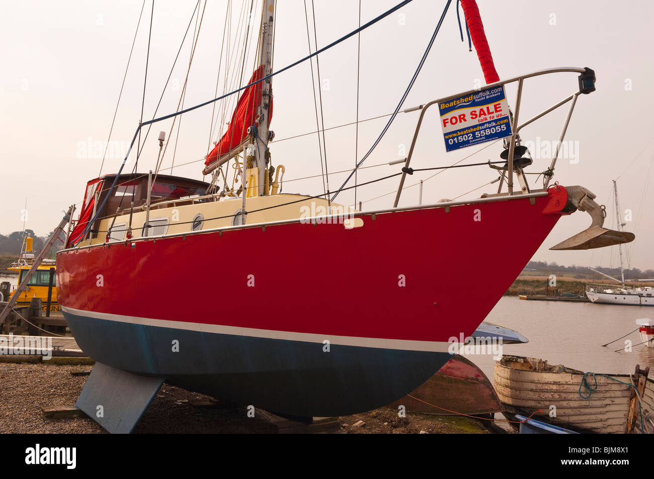 A boat for sale at the harbour in Southwold , Suffolk , England