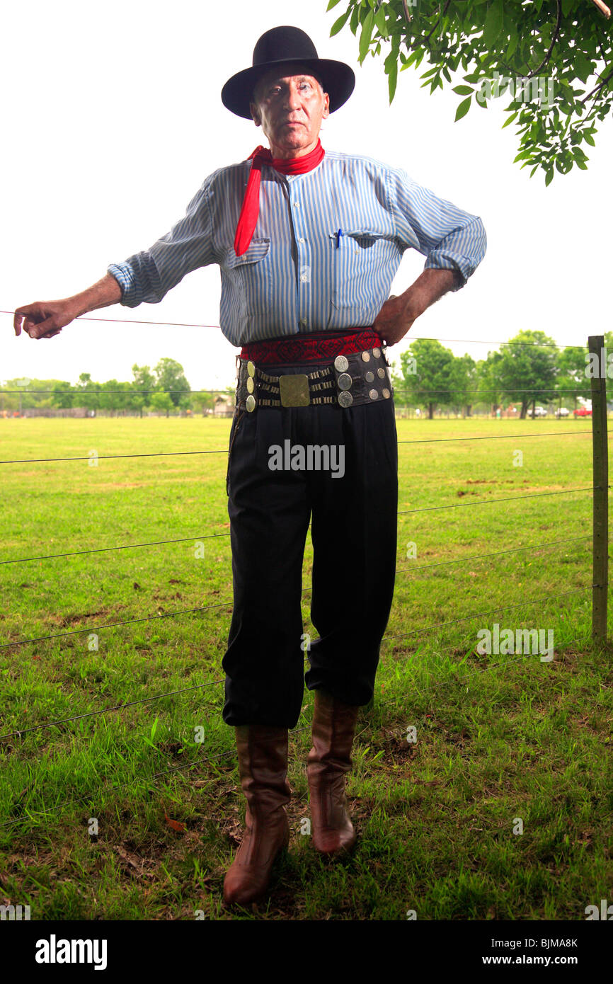 Paisano (modern gaucho) with traditional customs and rastra with facon at San Antonio de Areco Gaucho Festival. Stock Photo
