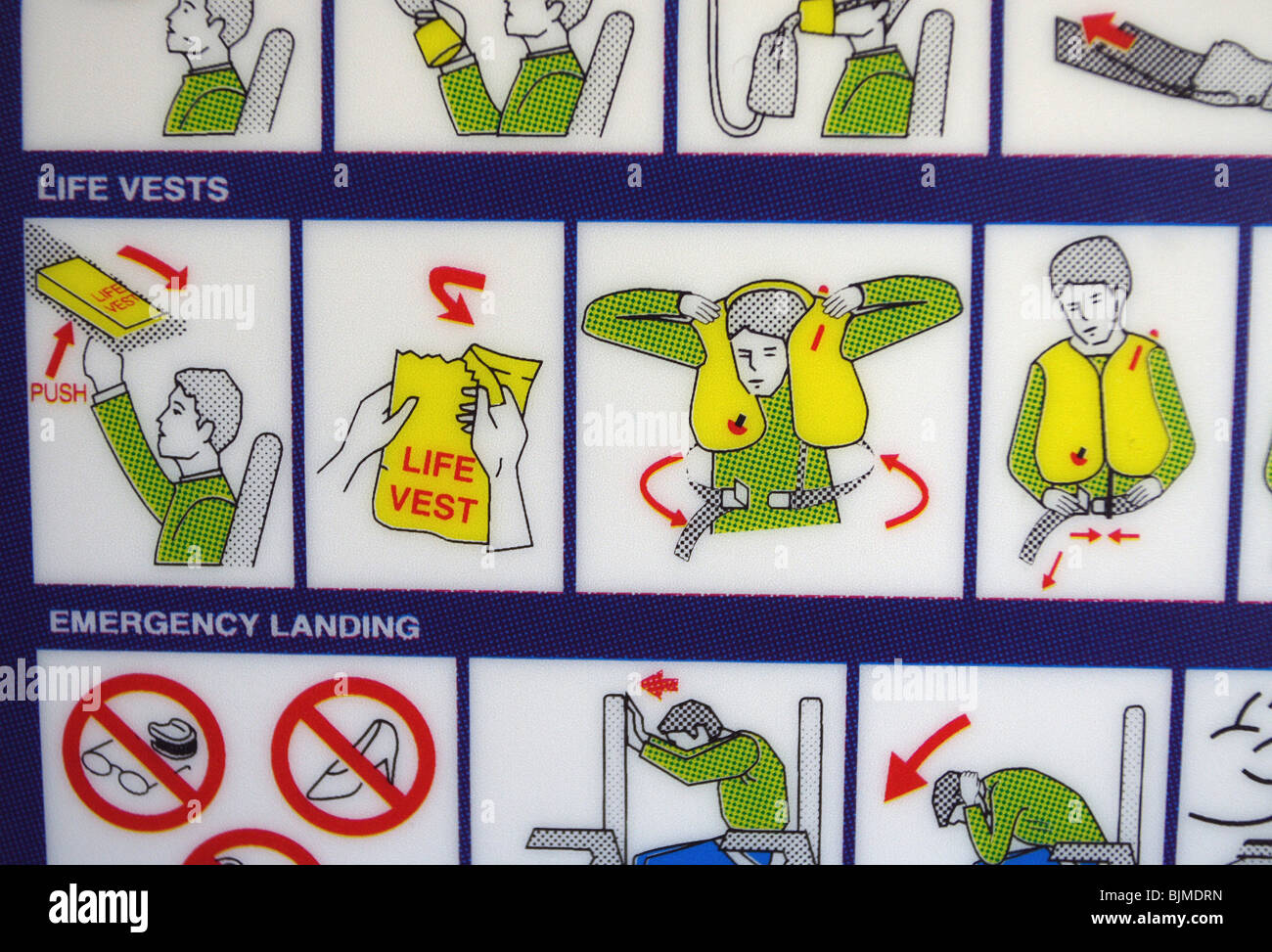 Security advice on a headrest in an aeroplane Stock Photo