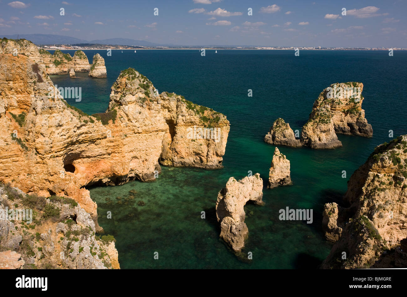 Eroding cliffs, stacks and islets at Ponta da Piedade, near Lagos, Algarve, Portugal. Stock Photo