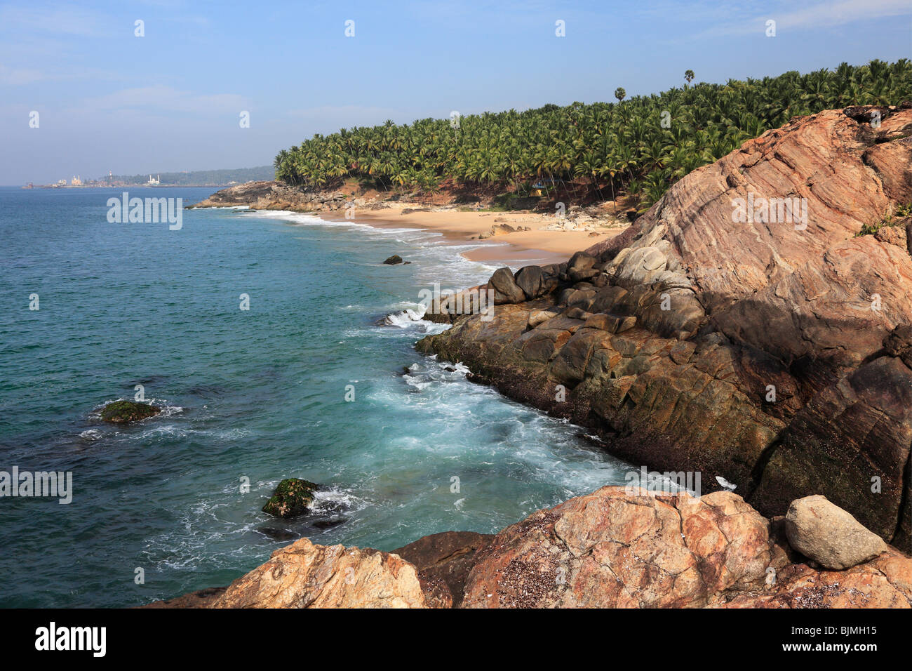Rocky coast and sandy beach south of Vizhnijam, Malabarian Coast, Malabar, Kerala state, India, Asia Stock Photo