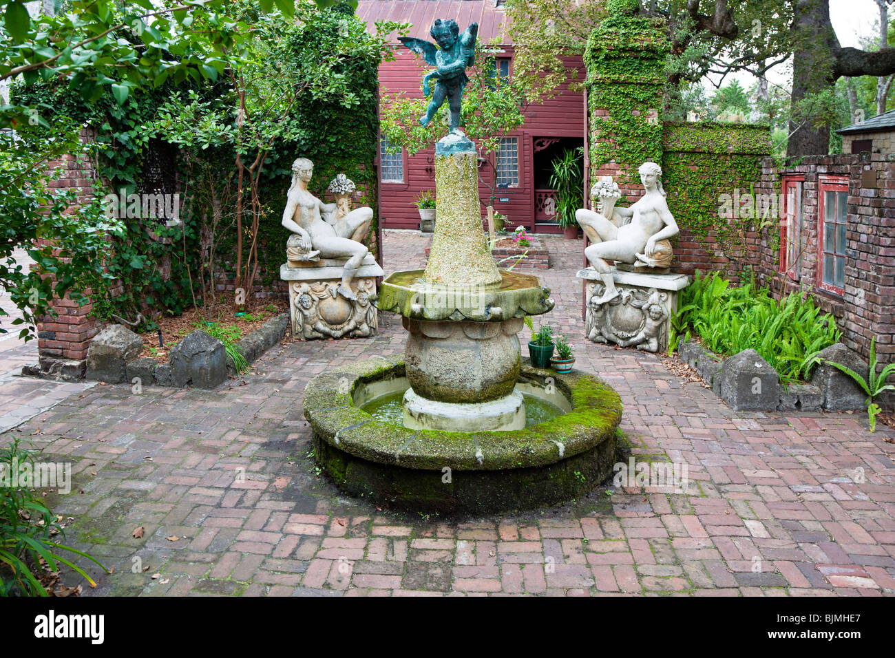 St. Augustine, FL - Jan 2009 - Quaint brick paved courtyard with sculptures and fountain in St. Augustine, Florida Stock Photo
