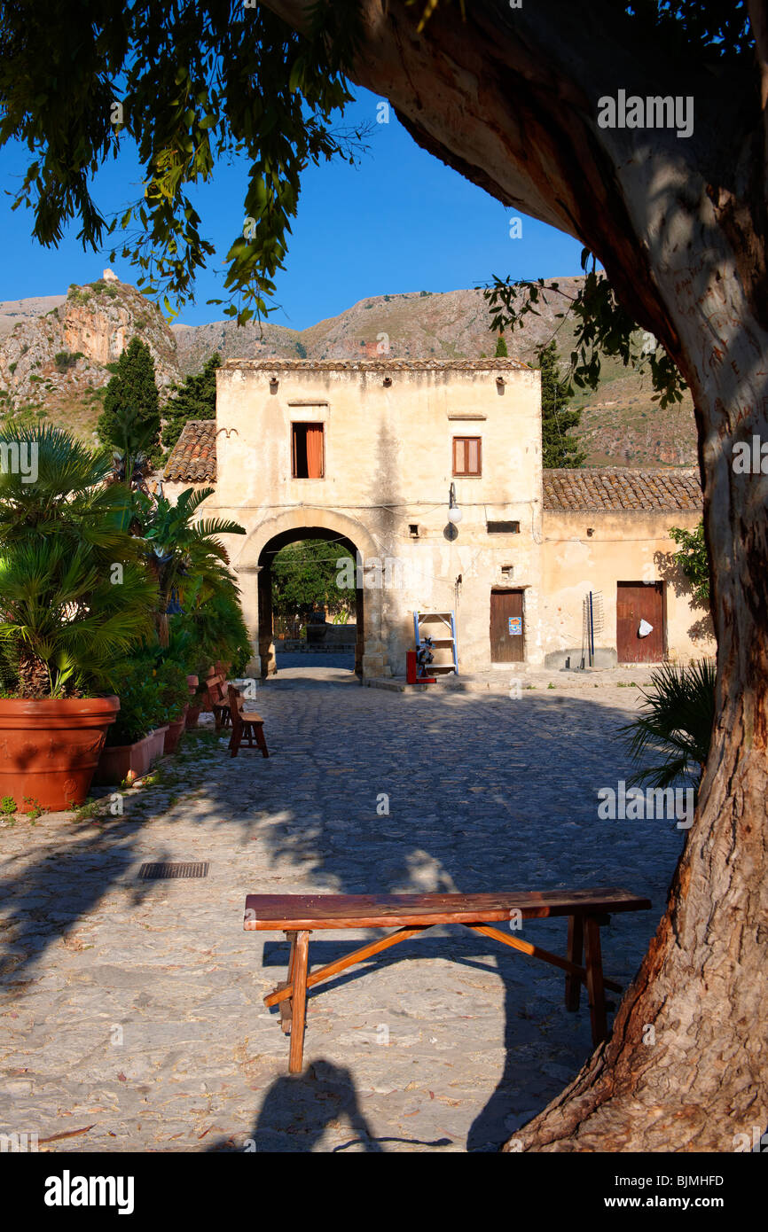 Restaurants in the baglio di Scopello courtyard [ manor house of scopello ] Castellammare  Del Golfo , Sicily Stock Photo - Alamy