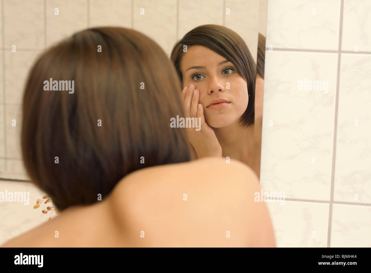 Woman, dark-haired, young, bathroom, mirror, look Stock Photo