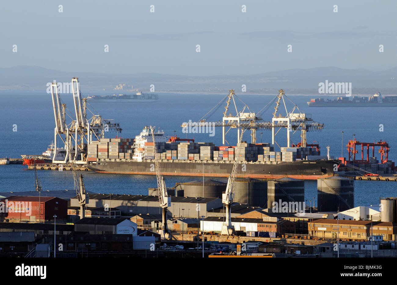 Shipping Container terminal in the port of Cape Town South Africa alongside is the ship MAERSK Durham loading and unloading ZA Stock Photo