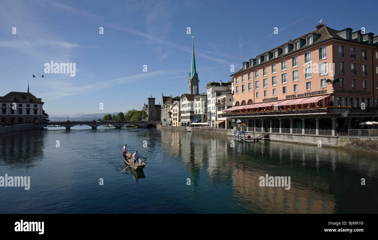 The Fraumünster Abbey and The Storchen hotel near the Limmat river, Zurich, Switzerland Stock Photo
