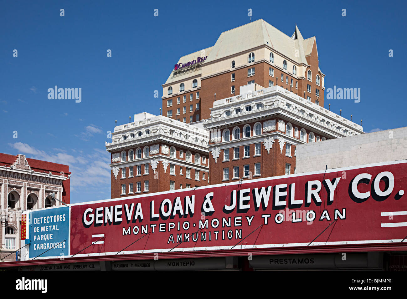 Sign for loans money and ammunition with Camino Real hotel in background El Paso Texas USA Stock Photo