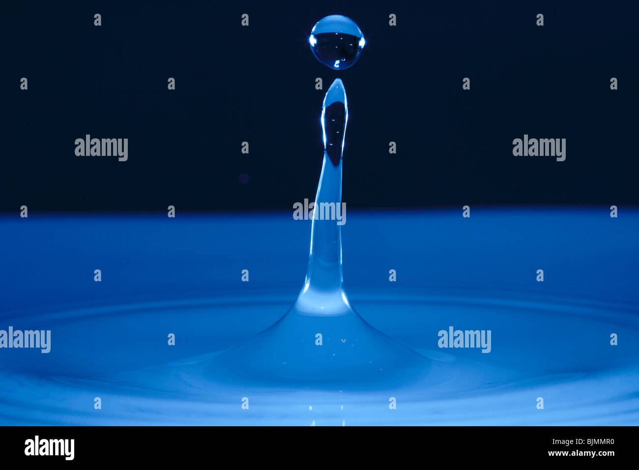 Water drop hitting a water surface Stock Photo Alamy