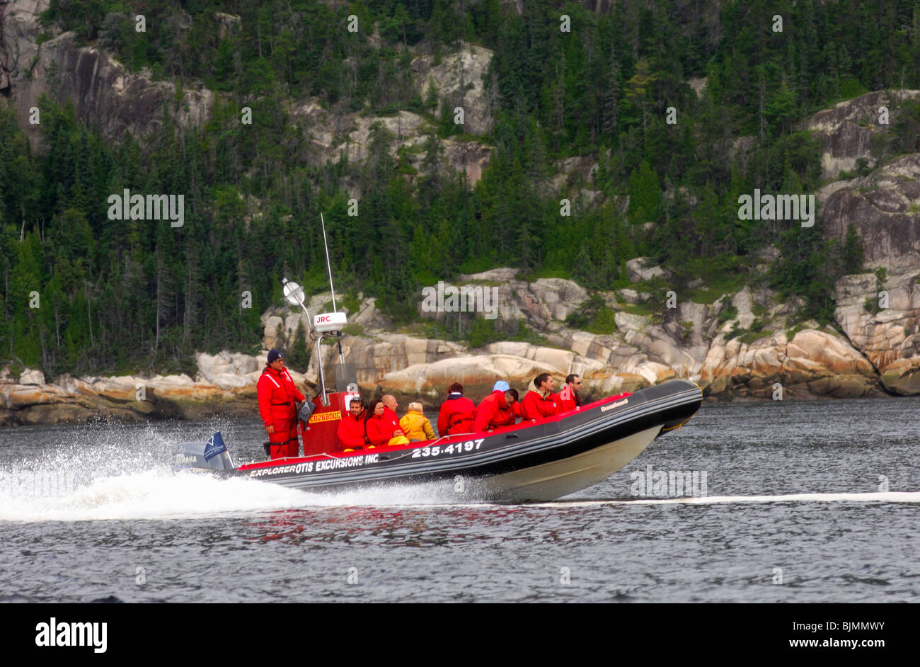 Tourists in a Zodiac inflatable boat of the Otis Excursions Inc