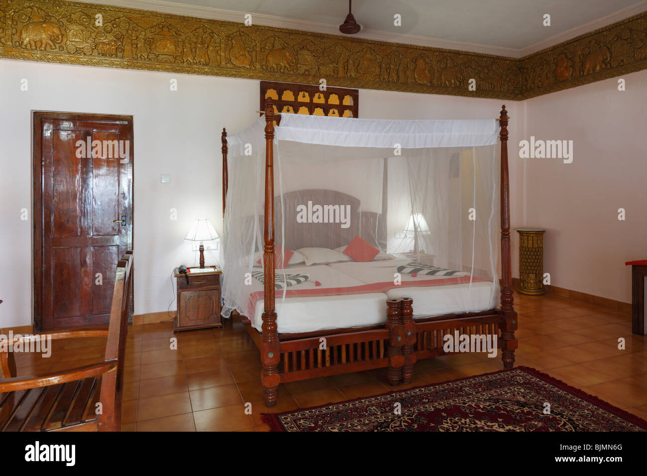 Hotel room with a mosquito net over the bed, Bethsaida Hermitage near Kovalam, Kerala, southern India, India, Asia Stock Photo