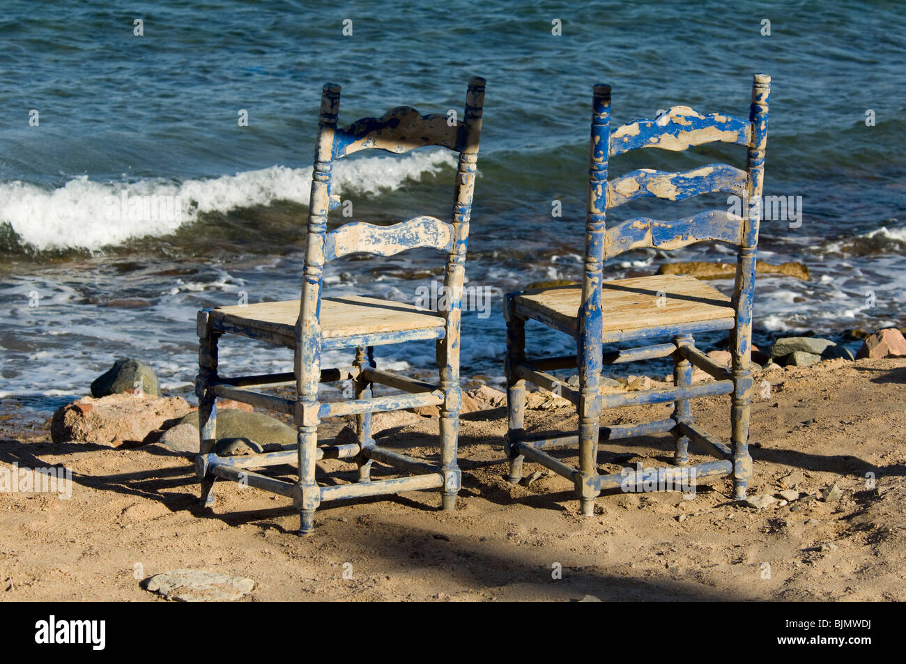 Two wooden chairs facing hi-res stock photography and images - Alamy