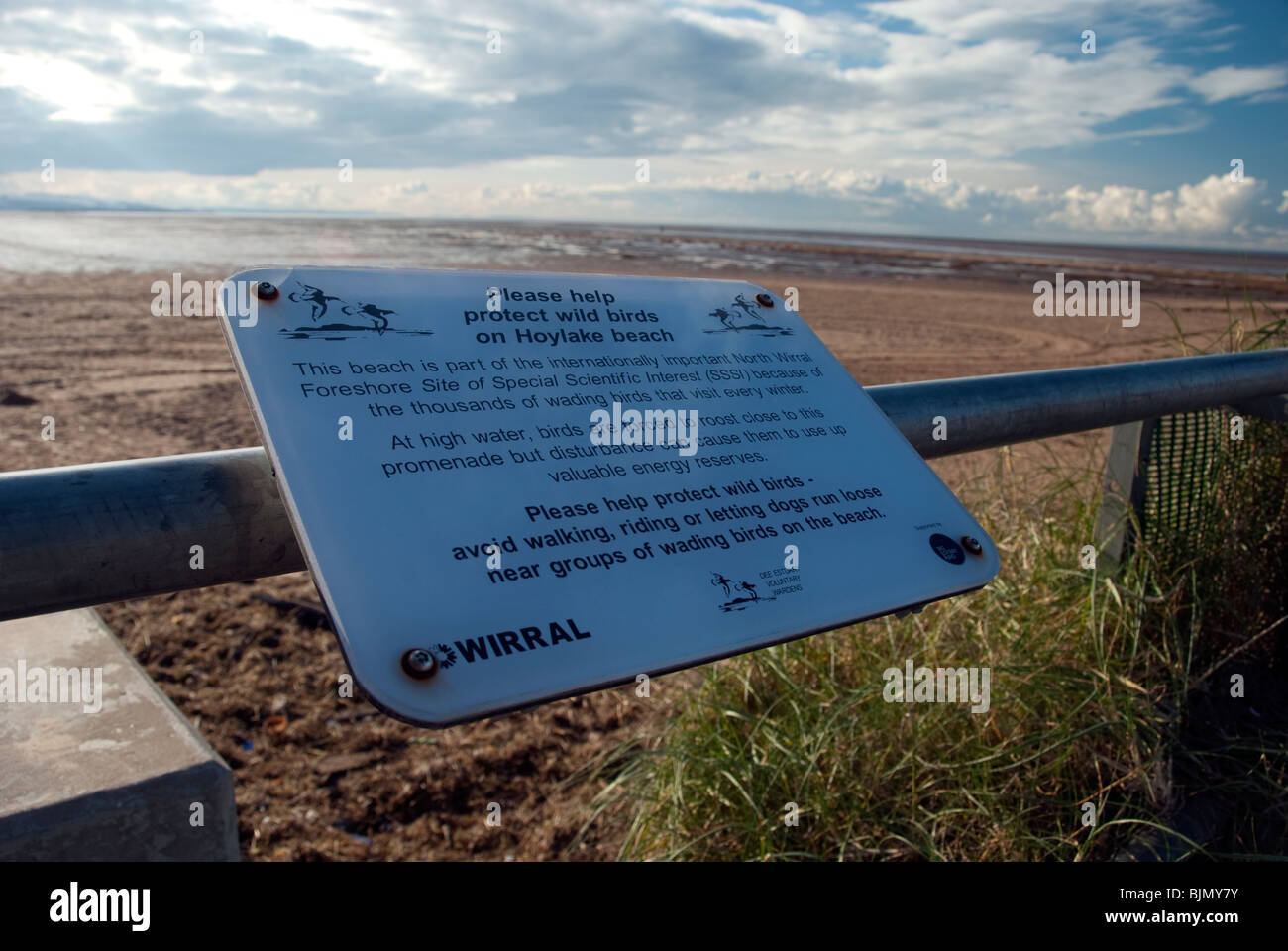 Detail of one of the signs along the railings at Hoylake on the Dee Estuary asking visitors not to disturb the wading birds Stock Photo