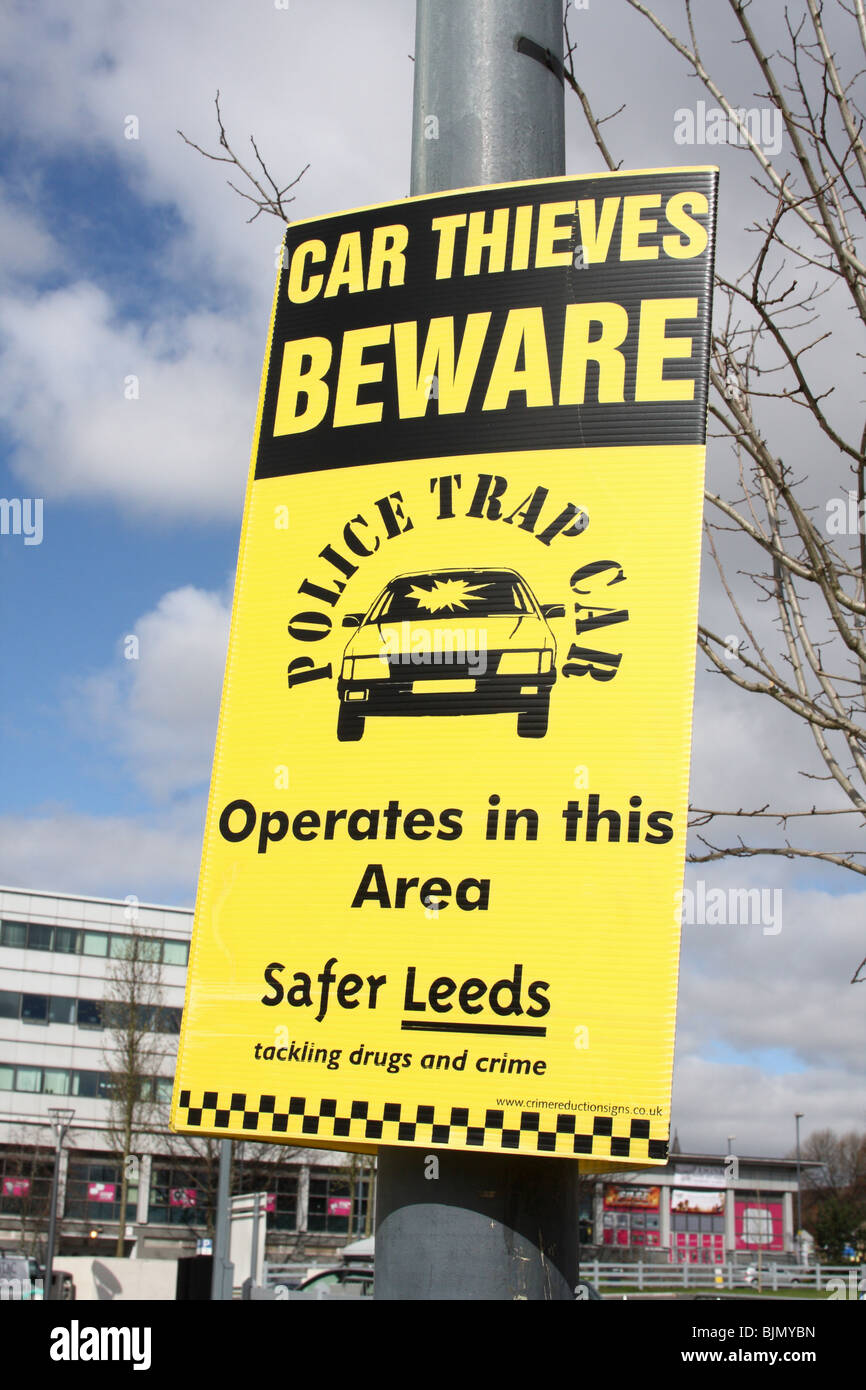 A Police Trap Car warning sign in a U.K. city. Stock Photo