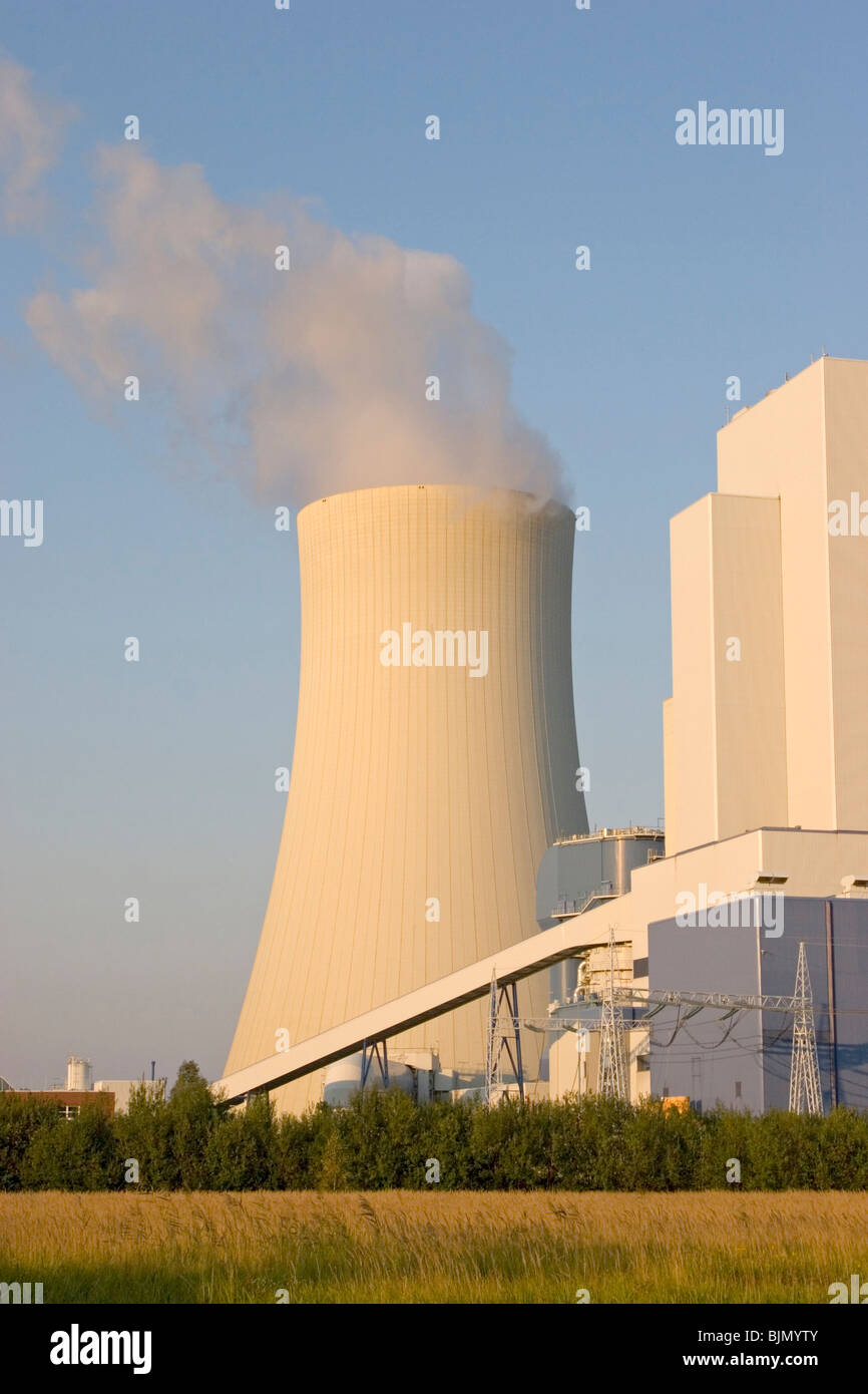smoky coal fired power station with blue sky Stock Photo