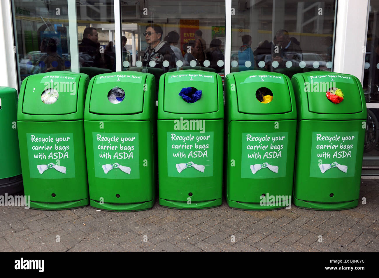 Asda store plastic carrier bags recycling point at the Brighton Marina UK Stock Photo