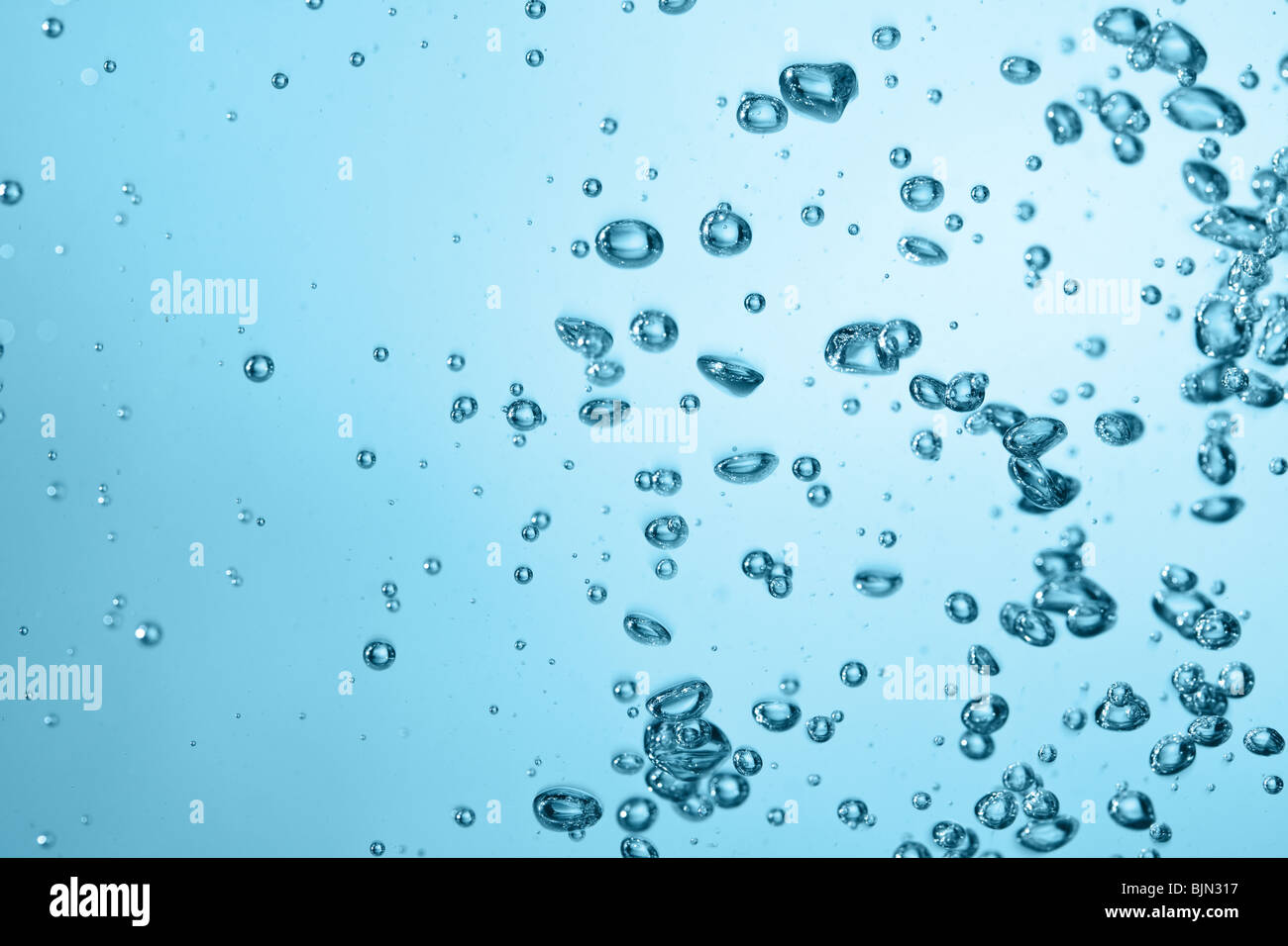 photo shot of air bubbles in water Stock Photo - Alamy