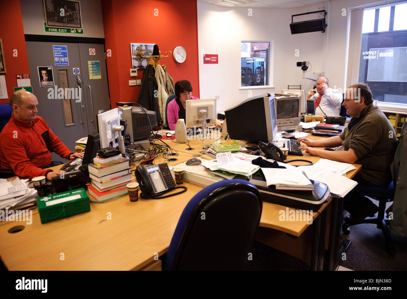 Journalists working in the BBC Radio Wales / Cymru online newsroom office  and studio, Aberystwyth Wales UK Stock Photo - Alamy