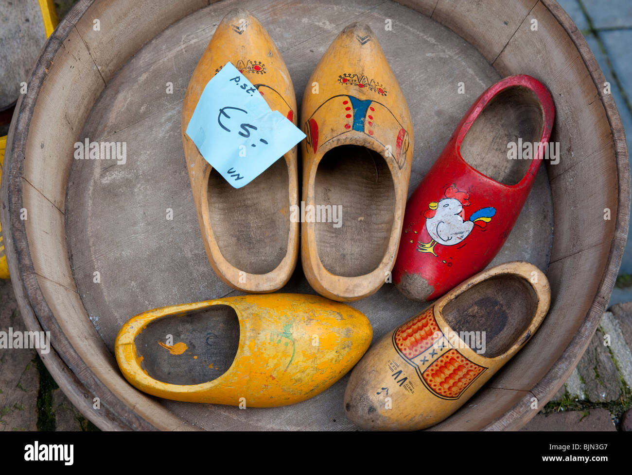 Traditional old painted wooden clogs in Delft, The Netherlands Stock Photo