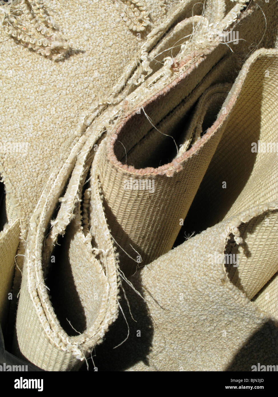 detail of old carpet in rubbish bin Stock Photo Alamy