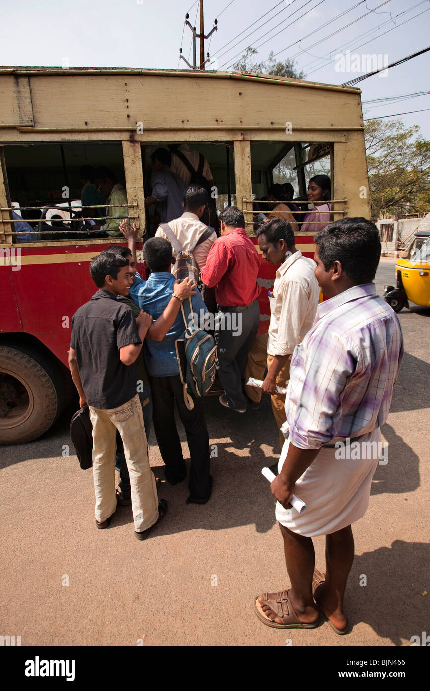 India, Kerala, Alappuzha, (Alleppey) young men boarding state bus at ...