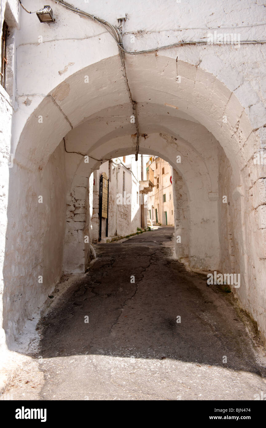 The alleys and narrow streets of the white city of Ostuni, Puglia, South Italy. Stock Photo
