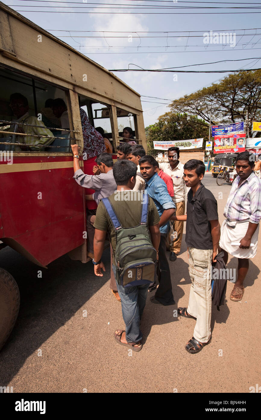 India, Kerala, Alappuzha, (Alleppey) young men boarding state bus at ...