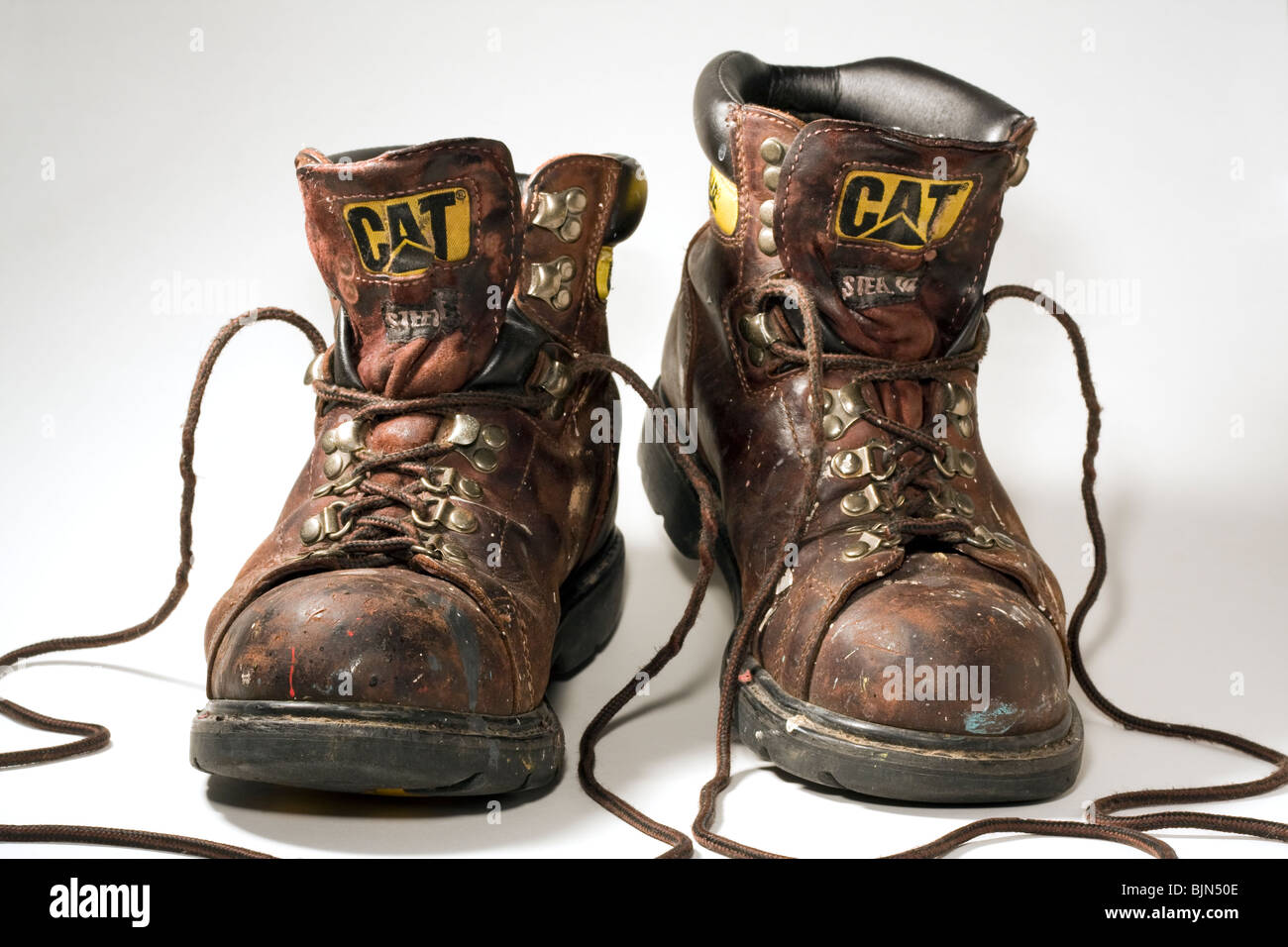 Caterpillar Steel Toed Work Boots on White Background. Stock Photo