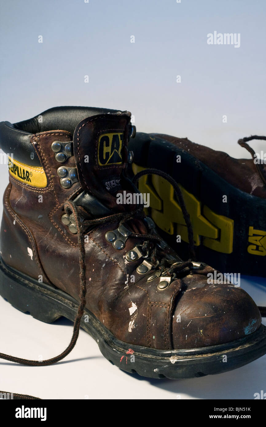 Caterpillar Steel Toed Work Boots on White Background. Stock Photo