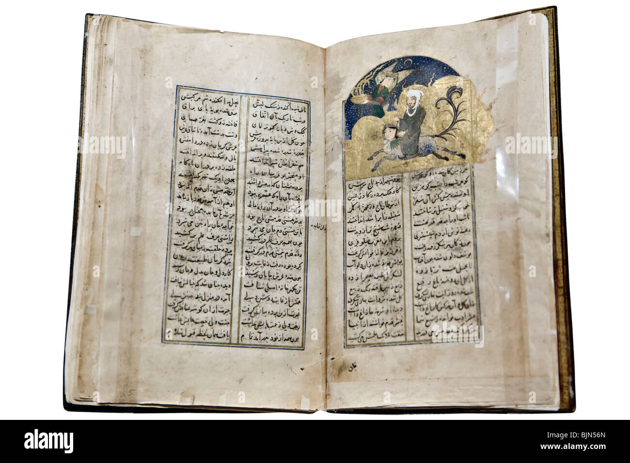 Old holy Islamic book with a painting of the prophet Mohammed Stock Photo