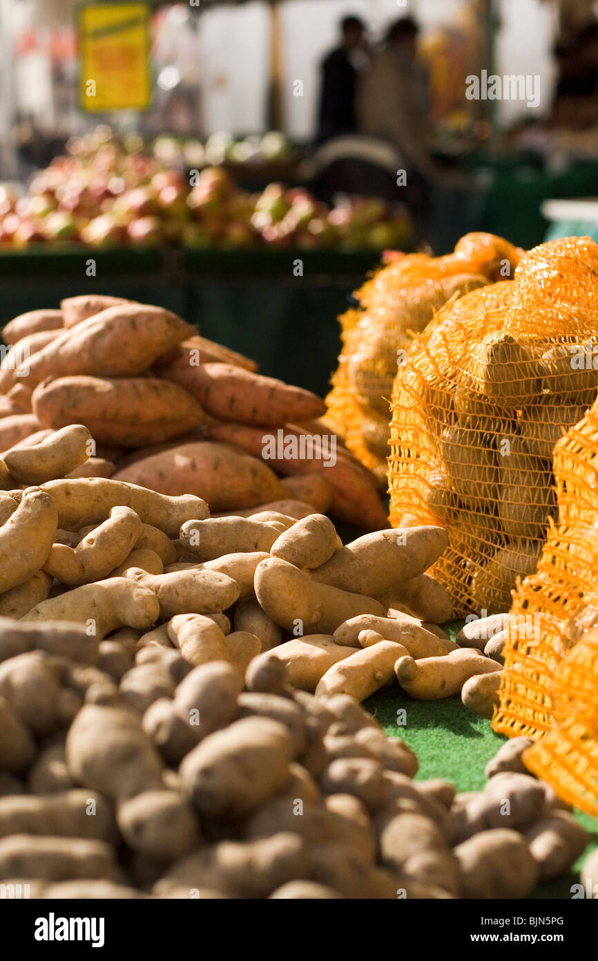 Potatoes at a market stall. Stock Photo