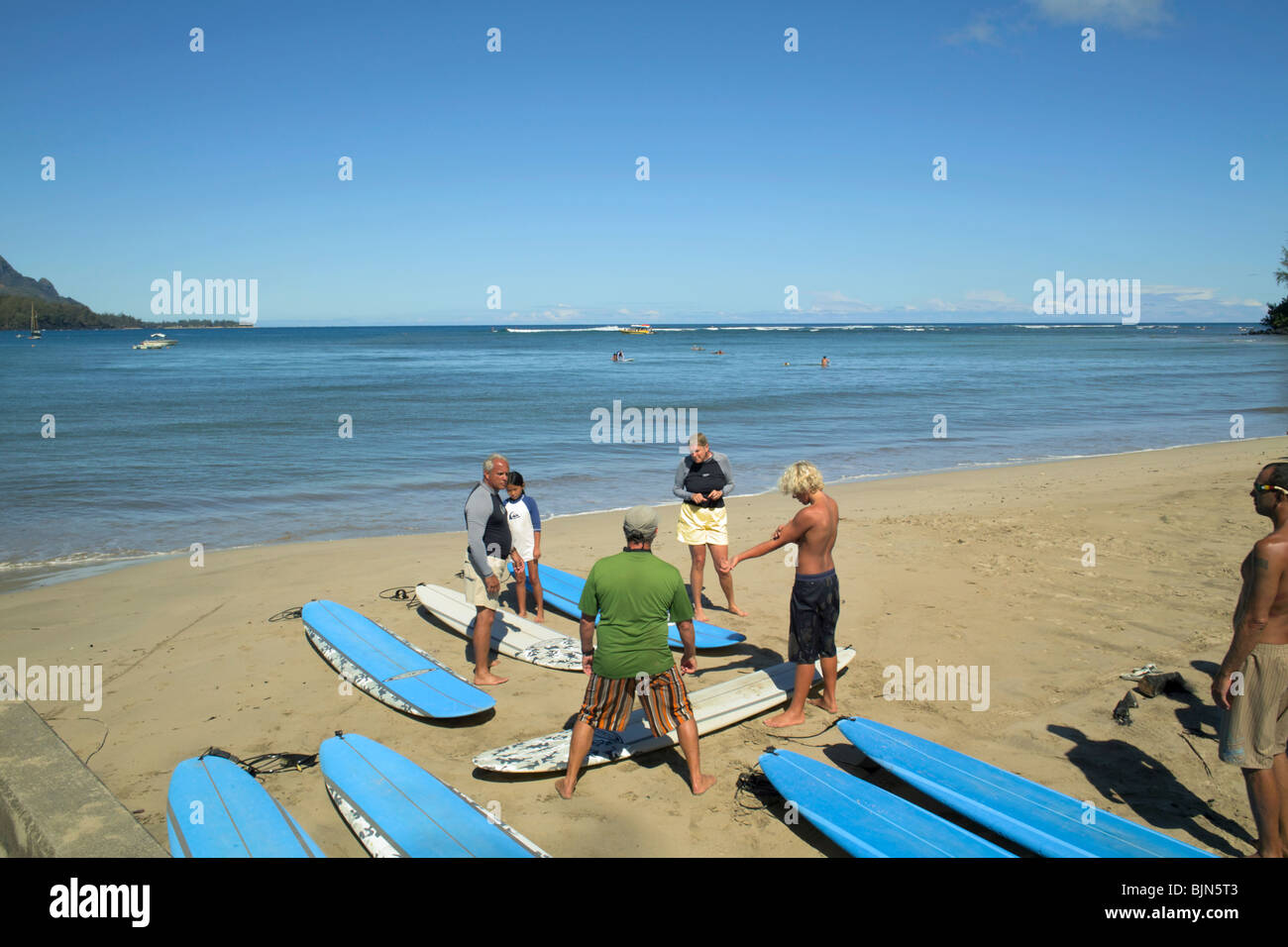 Surfing lesson on Black Pot Beach Hanalei Kauai HI Stock Photo Alamy