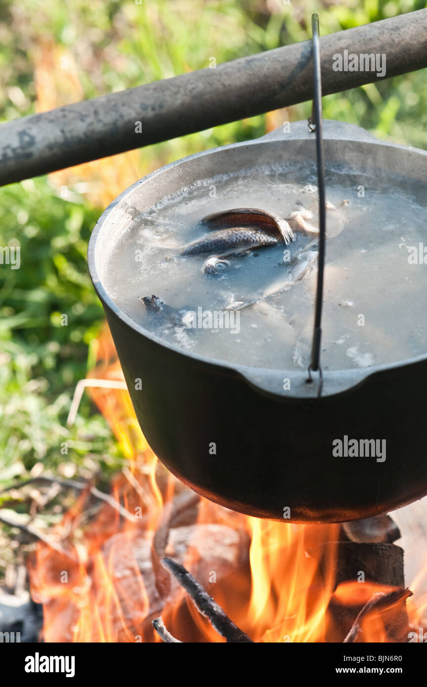 fish soup in castiron cauldron Stock Photo Alamy
