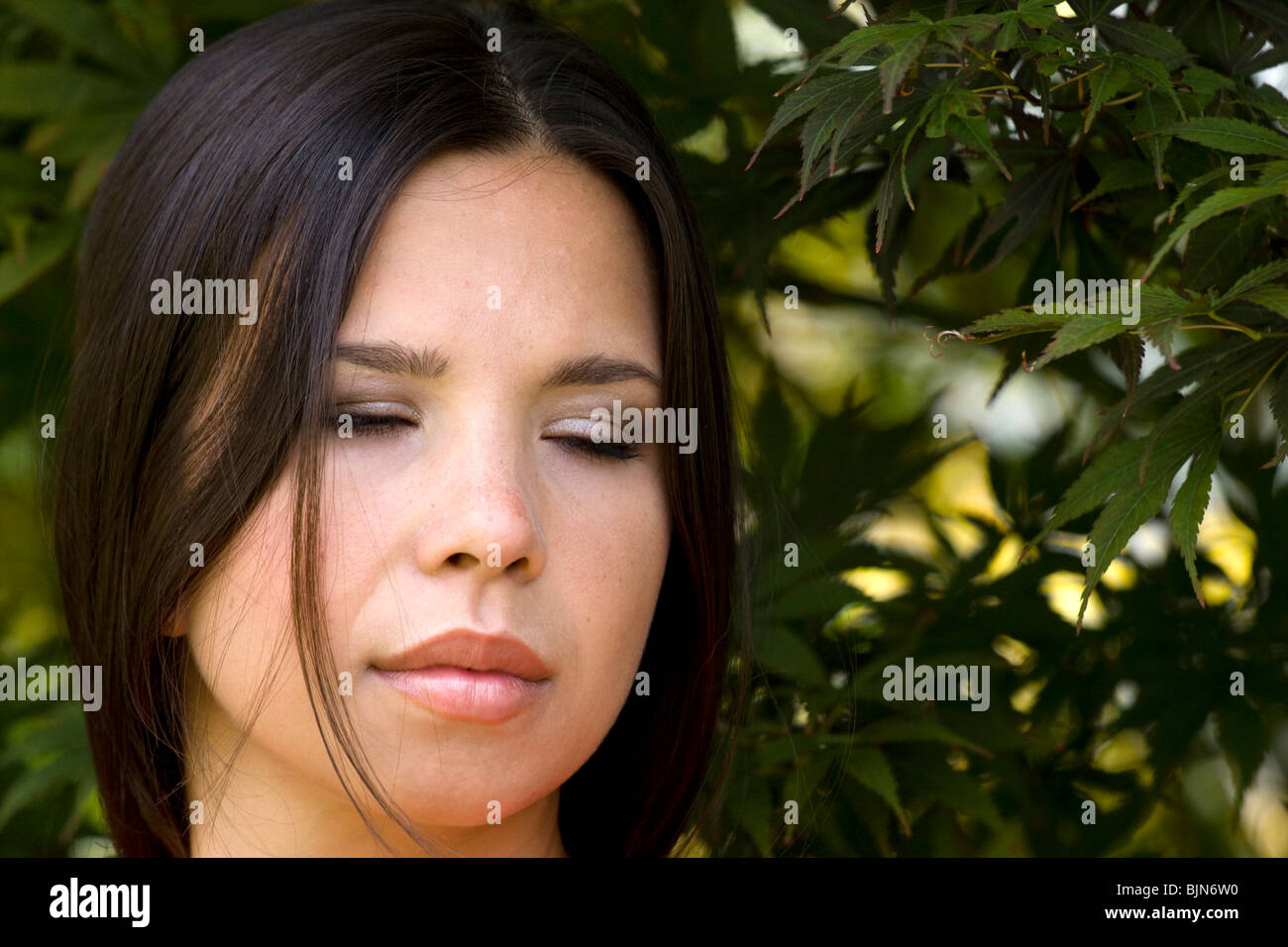 Portrait of the woman with her eyes closed Stock Photo - Alamy