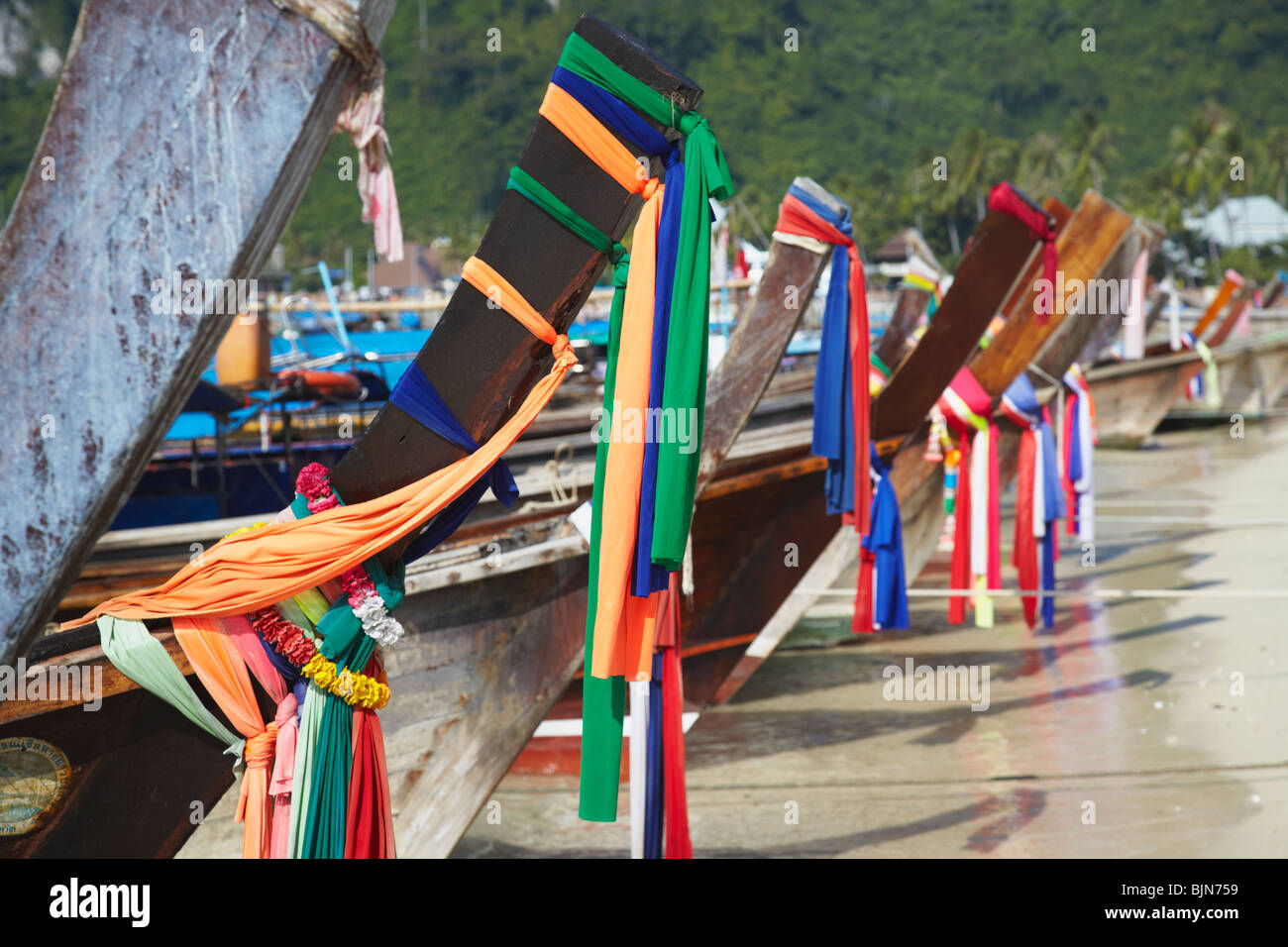 Long tail boats on Ao Ton Sai Beach, Ko Phi Phi Don, Krabi Province, Thailand Stock Photo