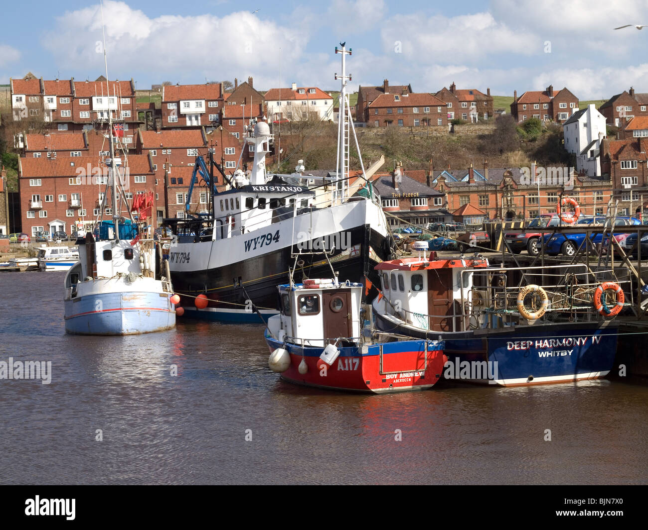 Fishing boats at Endeavour Wharf in Whitby harbour North Yorkshire UK