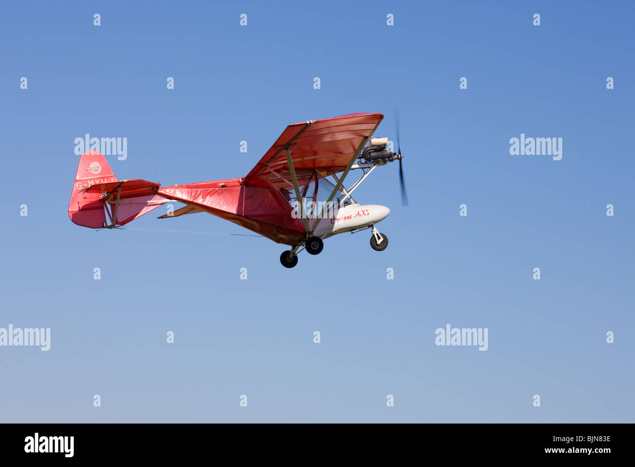Cyclone AX3-503 G-MYHJ in flight after taking-off from Breighton Airfield Stock Photo