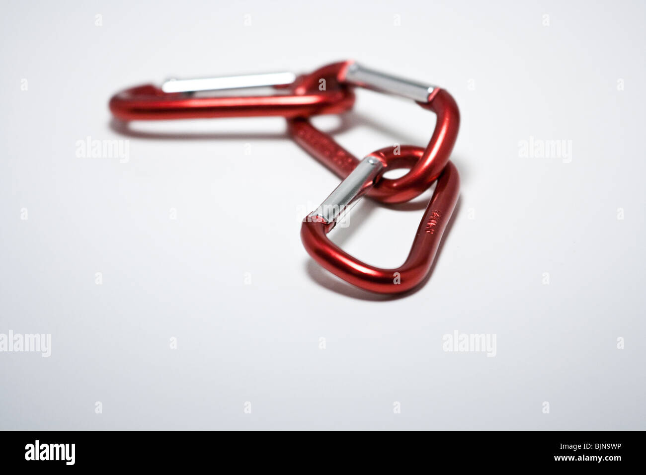 red metal chain three connect isolated cutout Stock Photo
