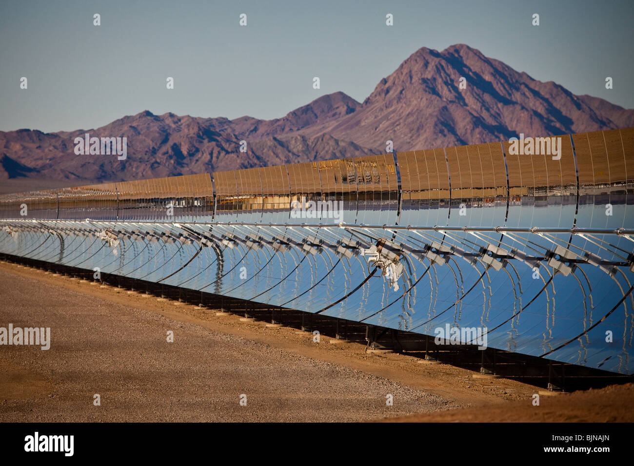 Ground level view of the massive parabolic mirrors at Nevada Solar One power plant in Boulder City, Nevada. Stock Photo
