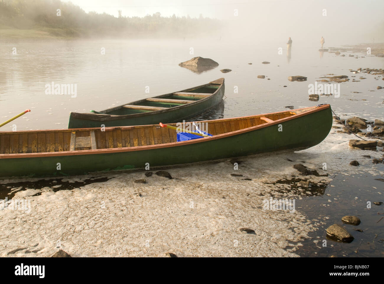 Canoes on the Miramichi River in New Brunswick, Canada used by salmon