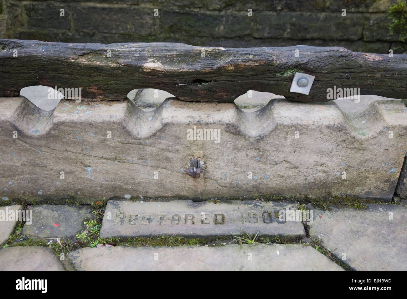 A set of old wooden Stocks at Haworth, West Yorkshire, UK Stock Photo