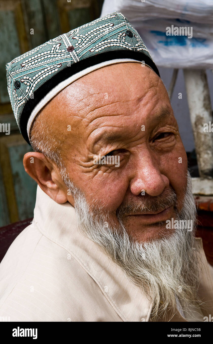 A smiling Uighur man. Stock Photo