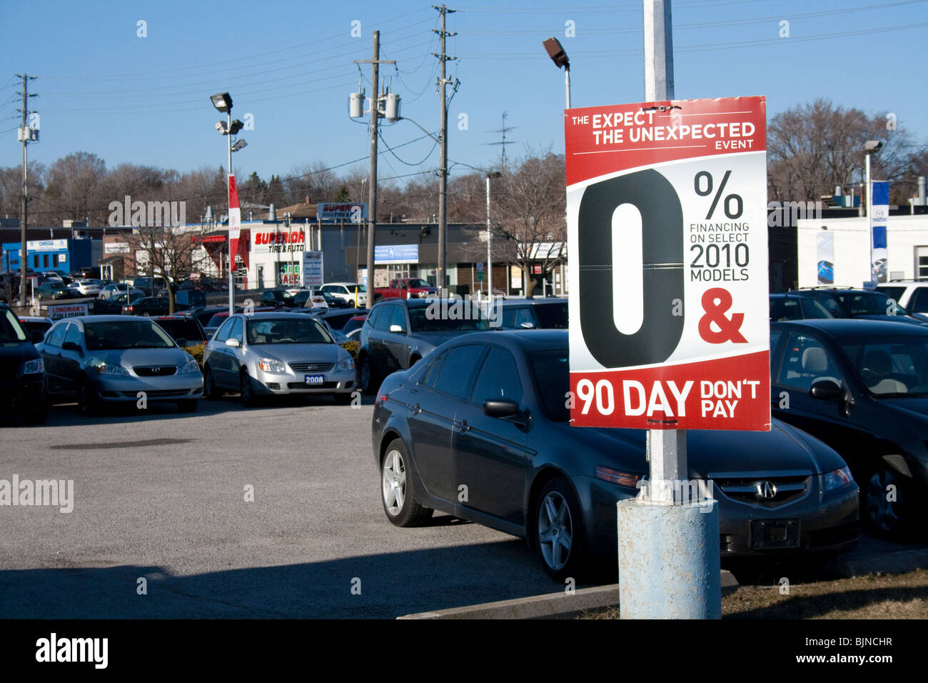 car sale auto market incentive rebate low financing leasing rate demo retail shop sign signs economy simulate import van sedan c Stock Photo