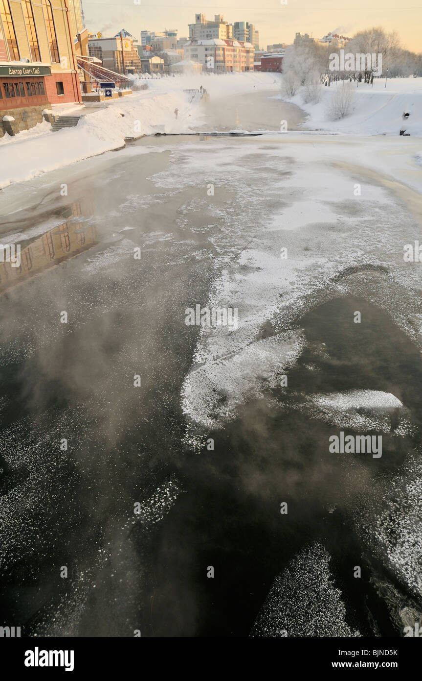 Ice on Iset river. Ekaterinburg city series Stock Photo