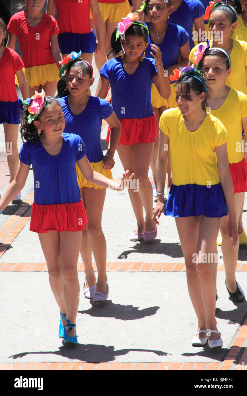 Girls acting with colorful clothes, Tunja, Boyaca, Colombia, South America. Stock Photo