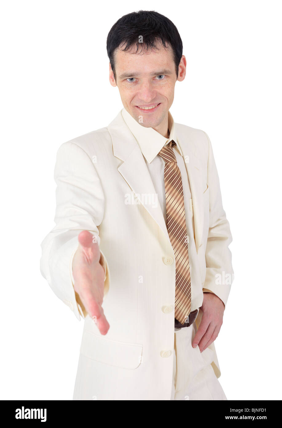 Friendly young man in a business suit on white background Stock Photo