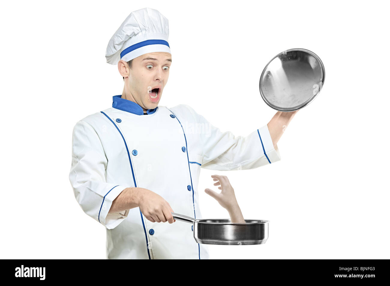 A surprised chef holding a frying pan Stock Photo Alamy