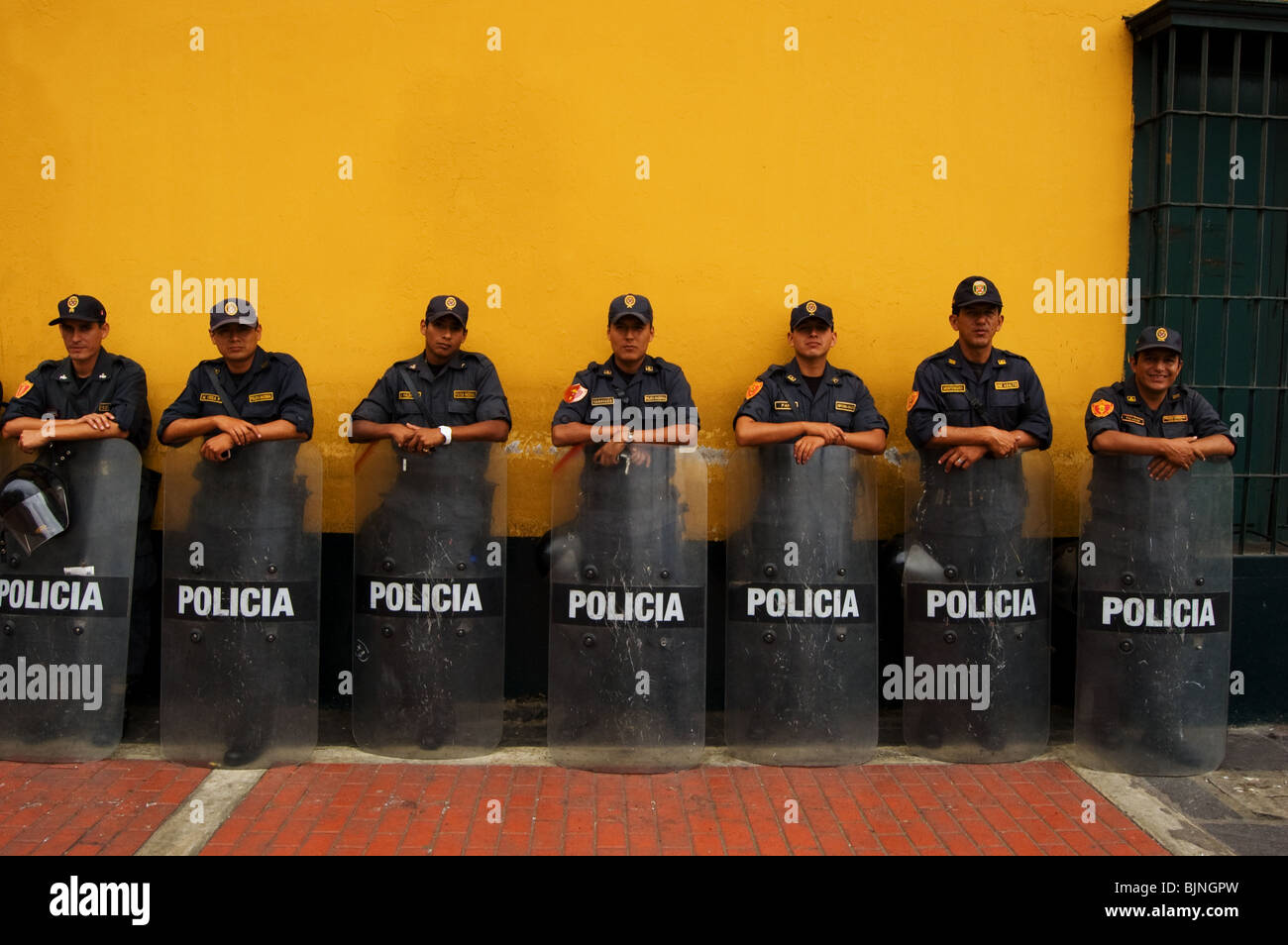 policemen standing in a row Stock Photo